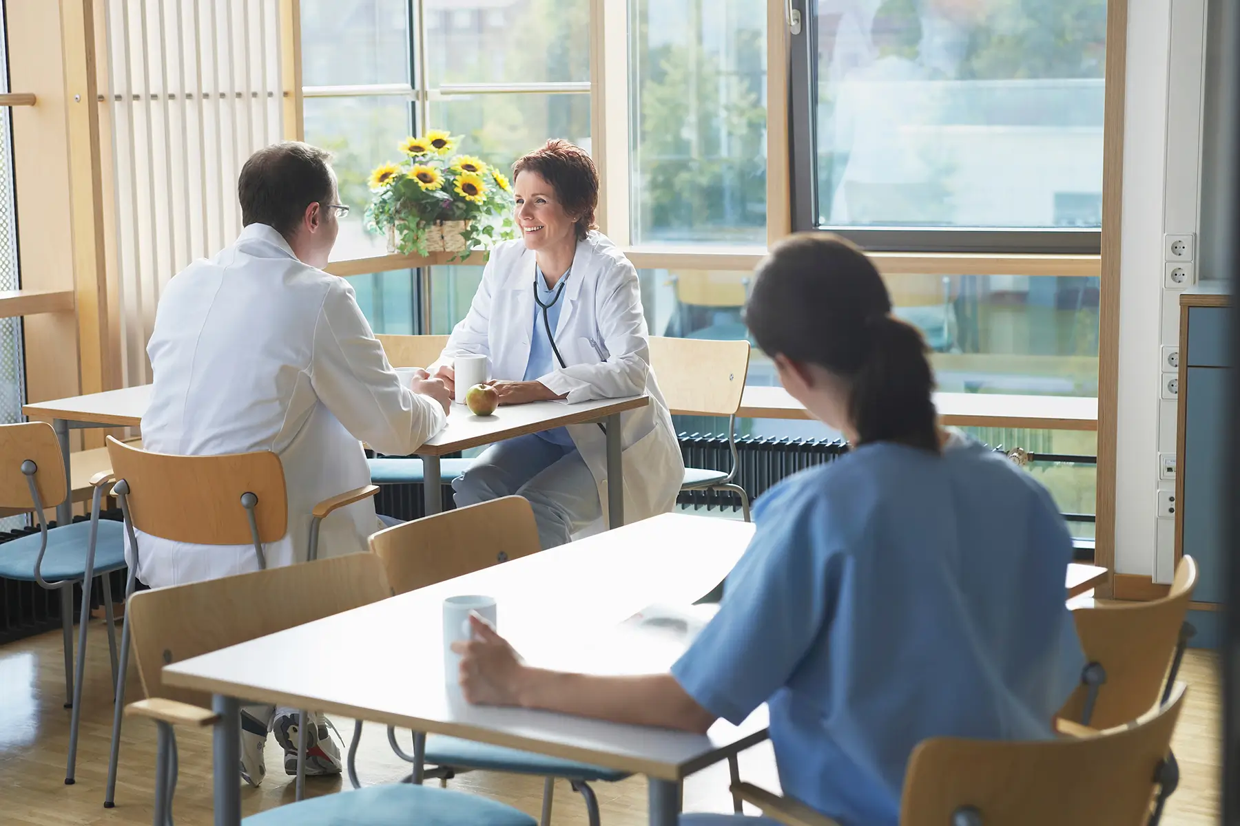 People eating in hospital cafeteria